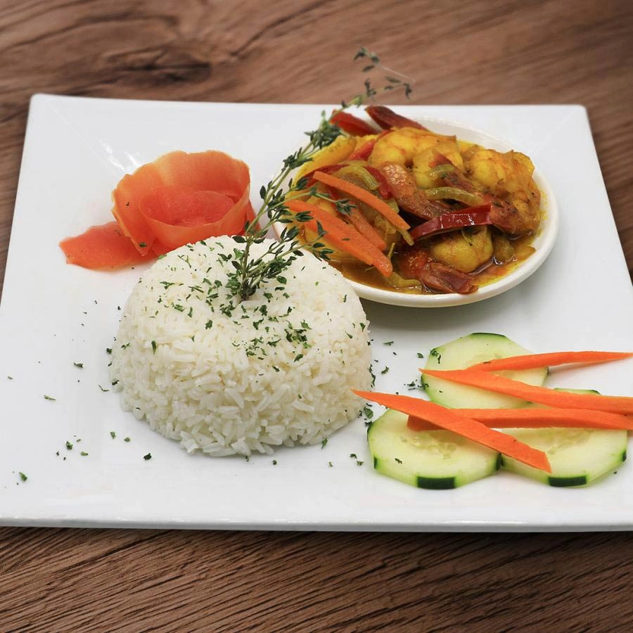 Square plate with white rice, and vegetables with shrimp